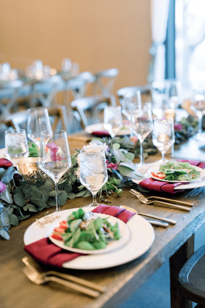 A salad preset on a wooden table