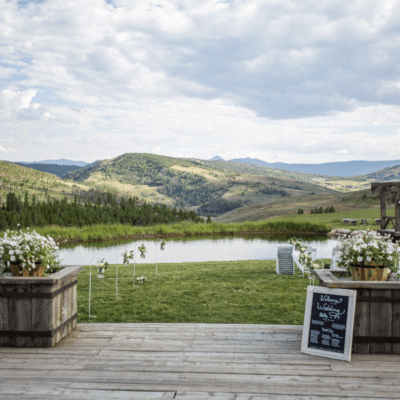 Outdoor wedding set up at Strawberry Creek Ranch overseeing the pond and rolling hills